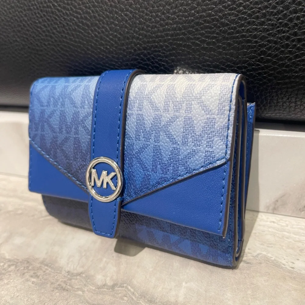 MICHAEL KORS Greenwich Medium Ombré Signature Logo Tri-Fold Wallet
Galaxy Blue - Picture 3 of 16